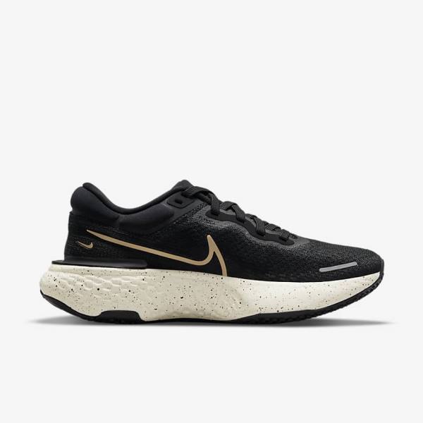 παπουτσια για τρεξιμο Nike ZoomX Invincible Run Flyknit δρομου γυναικεια μαυρα μεταλλικός χρυσο χρωμα | NK506ULE