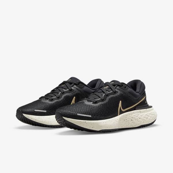 παπουτσια για τρεξιμο Nike ZoomX Invincible Run Flyknit δρομου γυναικεια μαυρα μεταλλικός χρυσο χρωμα | NK506ULE