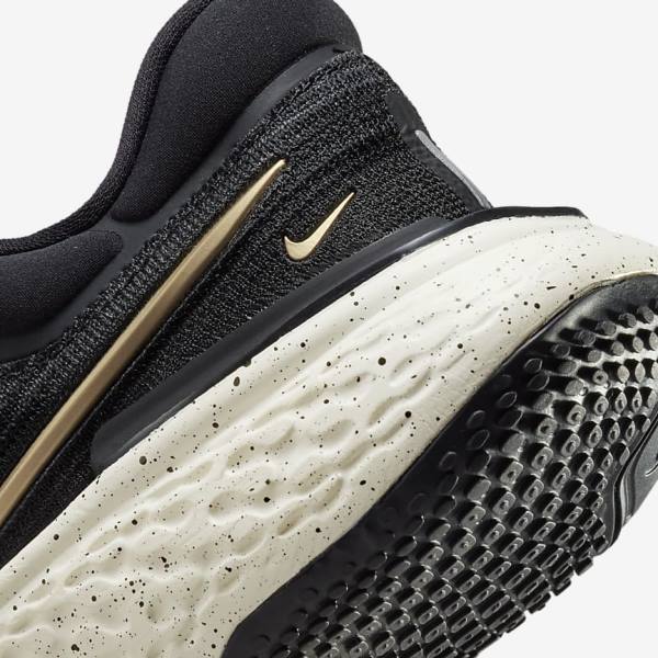 παπουτσια για τρεξιμο Nike ZoomX Invincible Run Flyknit δρομου γυναικεια μαυρα μεταλλικός χρυσο χρωμα | NK506ULE