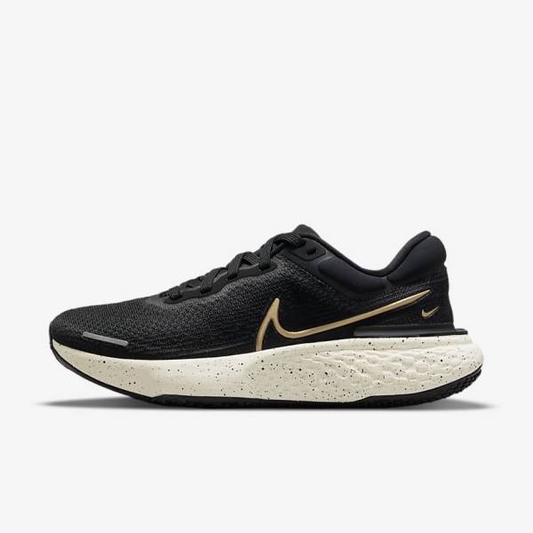 παπουτσια για τρεξιμο Nike ZoomX Invincible Run Flyknit δρομου γυναικεια μαυρα μεταλλικός χρυσο χρωμα | NK506ULE