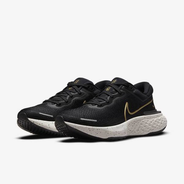 παπουτσια για τρεξιμο Nike ZoomX Invincible Run Flyknit δρομου ανδρικα μαυρα μεταλλικός χρυσο χρωμα | NK608FAQ